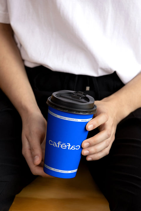 Download Take Away Coffee Cup PSD Mockup with person holding cup