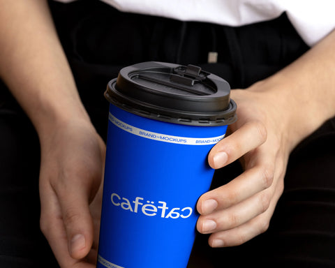 Download free Detail Shot Large Take Away Coffee Cup PSD Mockup person holding cup